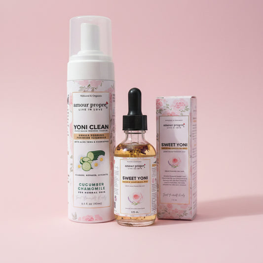 Three skincare products on a wooden surface with a white background