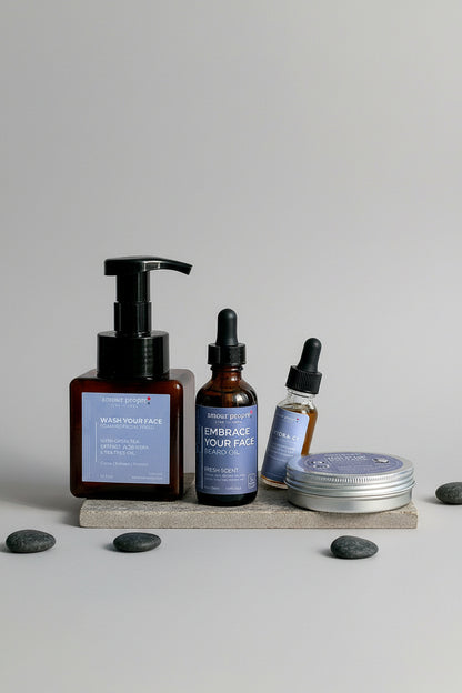 Amour Propre grooming products in a box with visible branding.