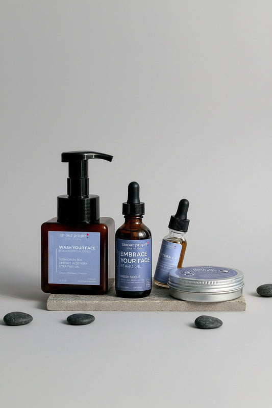 Amour Propre grooming products in a box with visible branding.