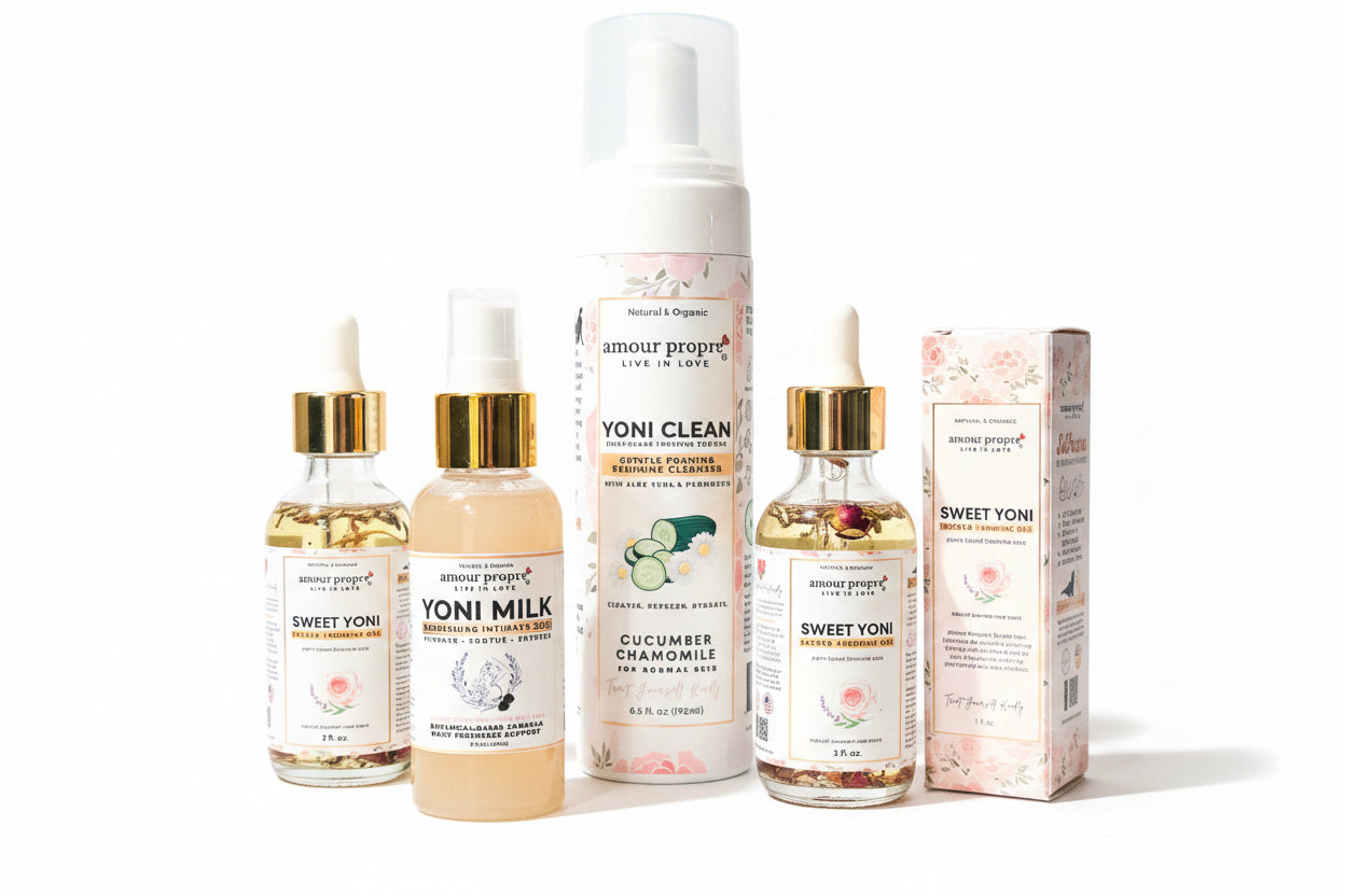 Collection of natural products including bottles and a box on a wooden surface with a neutral background.