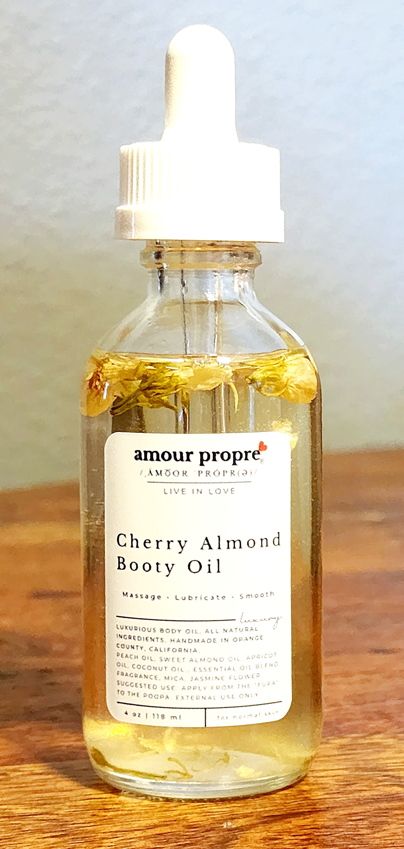 Kissably Soft Booty Oil, Cherry Almond Amour Propre Kissably Soft Booty Oil, Cherry Almond Amour Propre